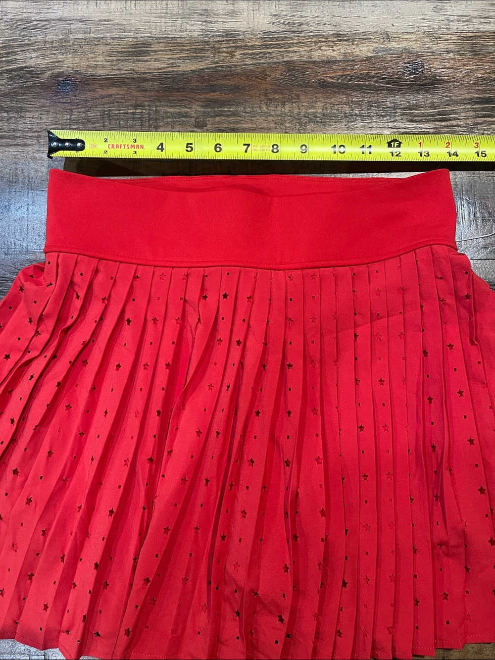 Thrive Red Pleated Mini Skirt with Star Cutout - Picture 2 of 5